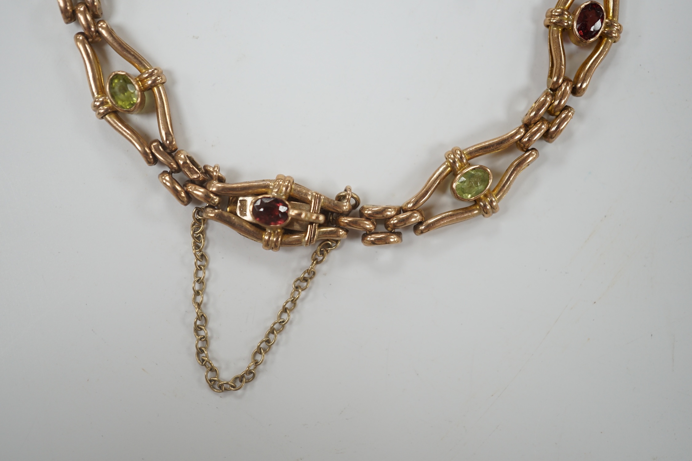 An Edwardian 9ct and gem set open link bracelet, 18cm, gross weight 9.3 grams.